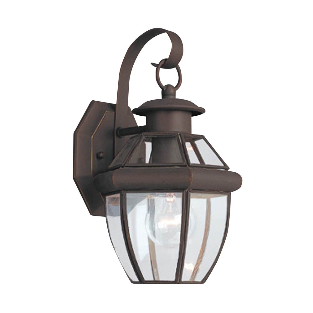 Generation Lighting Lancaster Traditional 1-Light Outdoor Exterior Small Wall Lantern Sconce In Antique Bronze Finish With Clear Curved Beveled Glass Shade