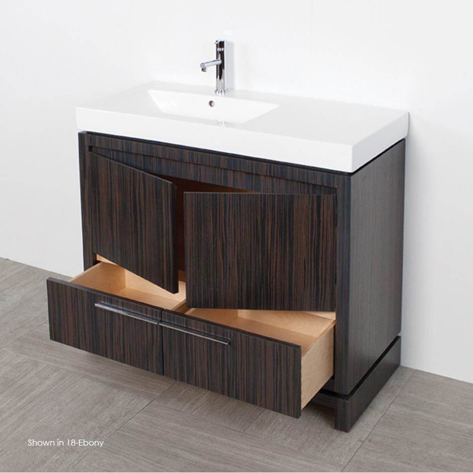 Lacava Free standing under counter vanity with finger pulls across top doors and polished chrome pulls across bottom drawers.